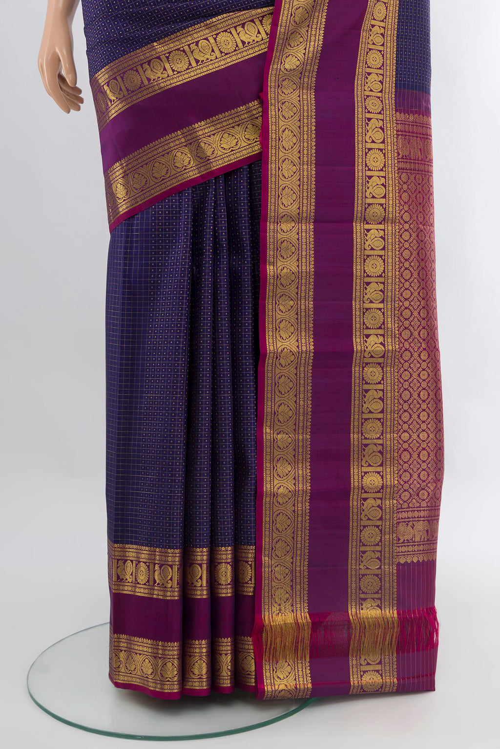 Pleats and pallu of Navy Blue Kanjivaram Silk Saree with Checked design on the body and Zari Border. 