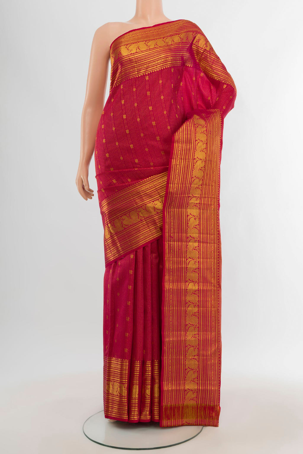 Dark Pink Kanjivaram Silk Saree with Zari Butta on the body and Zari Border.  displayed on a mannequin