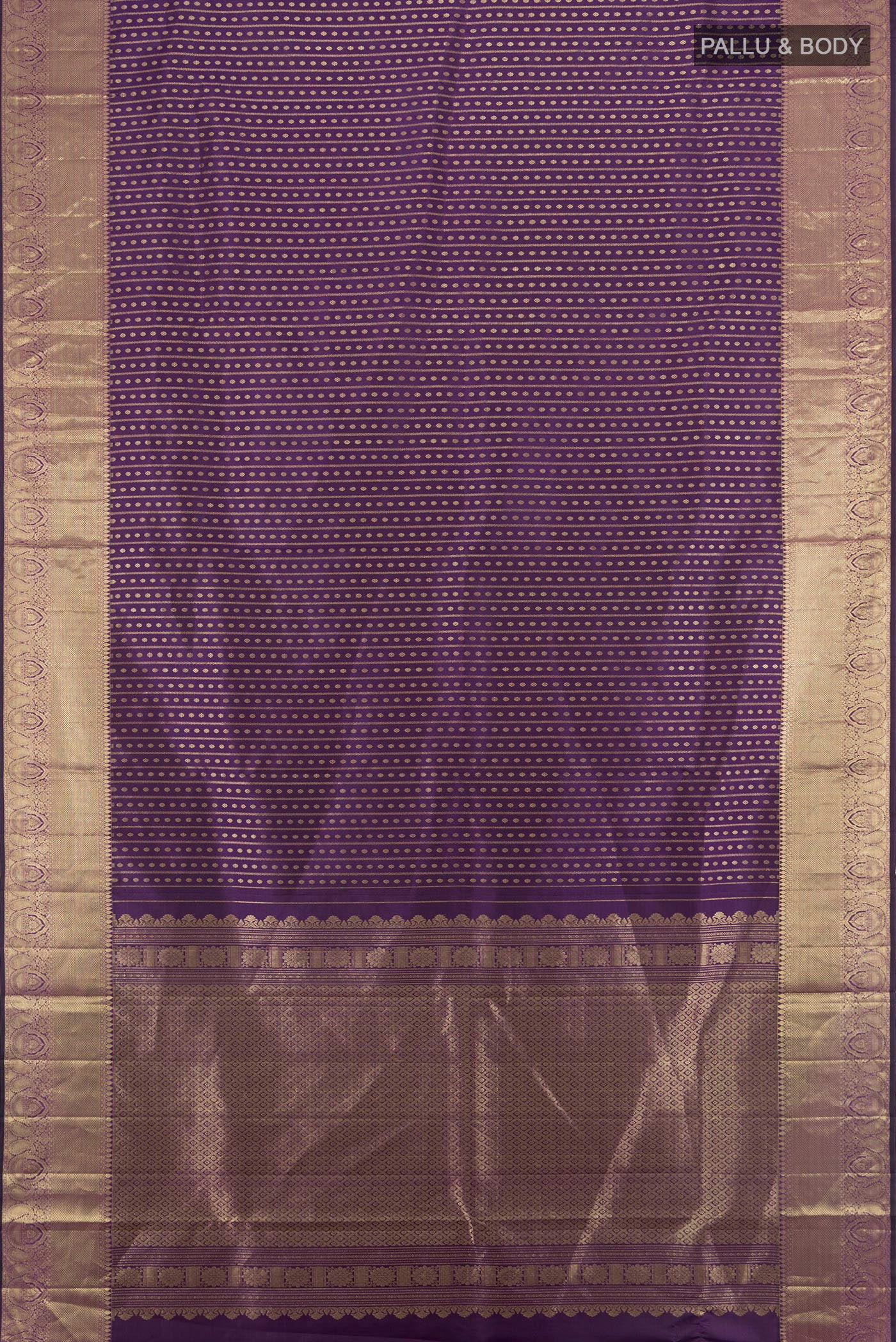 Flat view of Violet Kanjivaram Silk Saree with Zari Butta on the body and Zari Border. 
