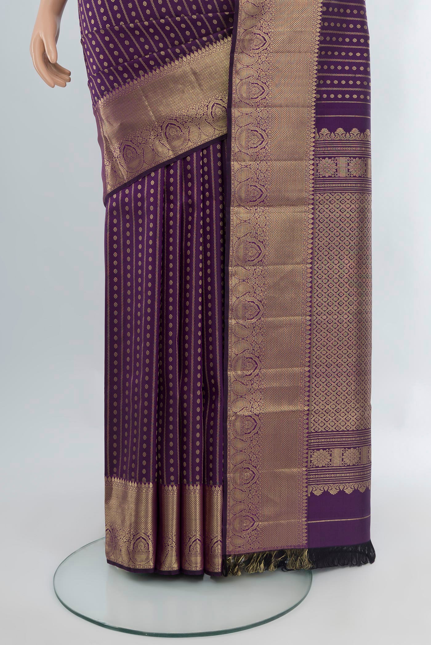 Pleats and pallu of Violet Kanjivaram Silk Saree with Zari Butta on the body and Zari Border. 