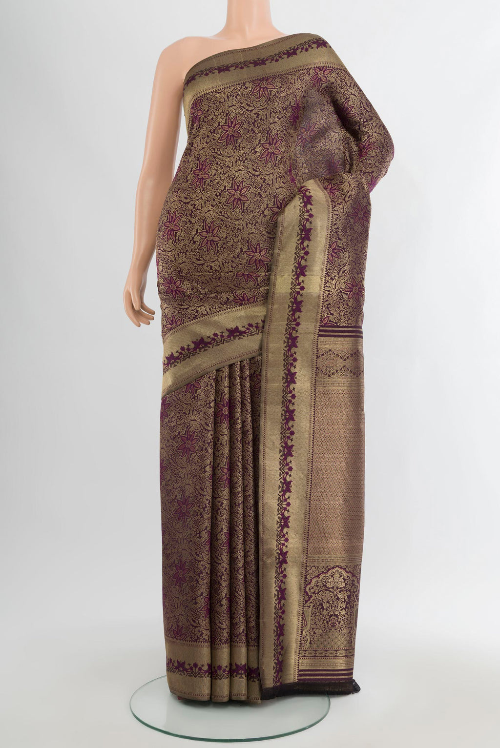 Purple Kanjivaram Silk Saree with Zari Brocade on the body and Zari Border.  displayed on a mannequin