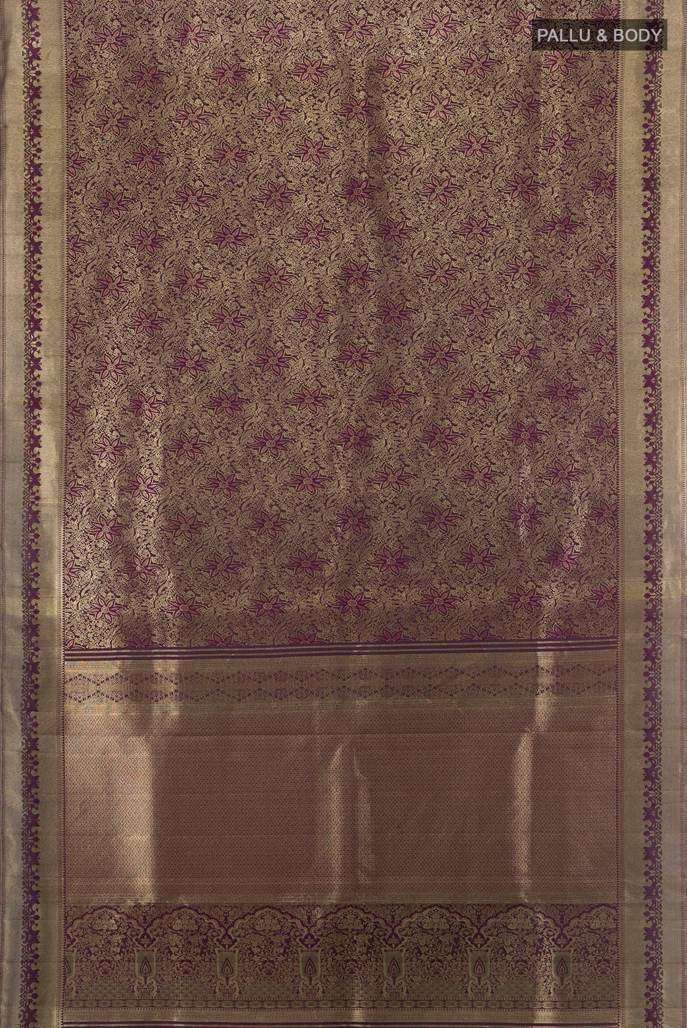 Flat view of Purple Kanjivaram Silk Saree with Zari Brocade on the body and Zari Border. 