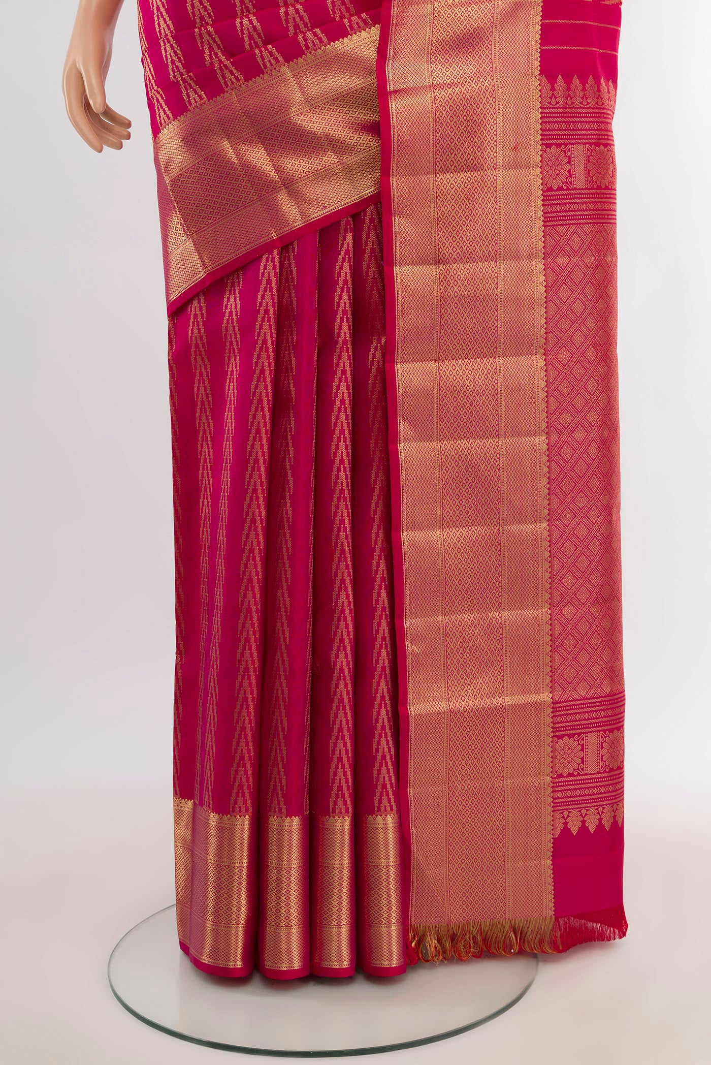 Pleats and pallu of Pink Kanjivaram Silk Saree with Zari Butta on the body and Zari Border. 