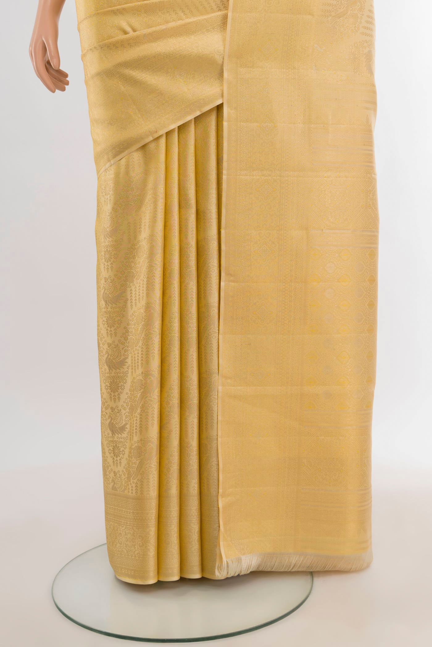 Pleats and pallu of Sandal Kanjivaram Silk Saree with Zari Brocade on the body and Zari Border. 