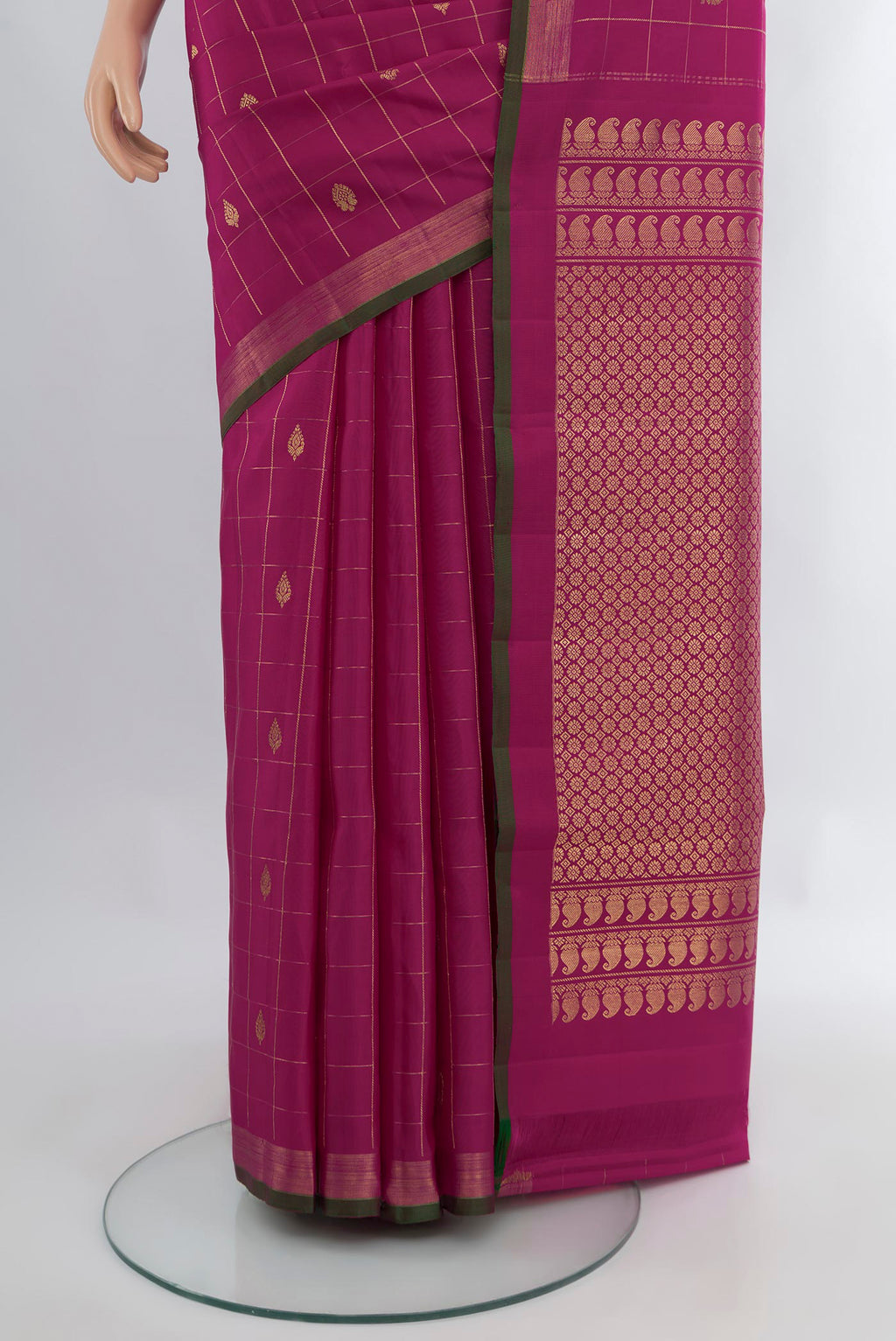 Pleats and pallu of Magenta Kanjivaram Silk Saree with Checked design on the body and Without Border. 