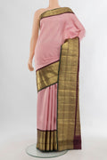 Pure Silk Rose pink Kanchipuram Saree with Checked design on the body and Zari Border.  displayed on a mannequin