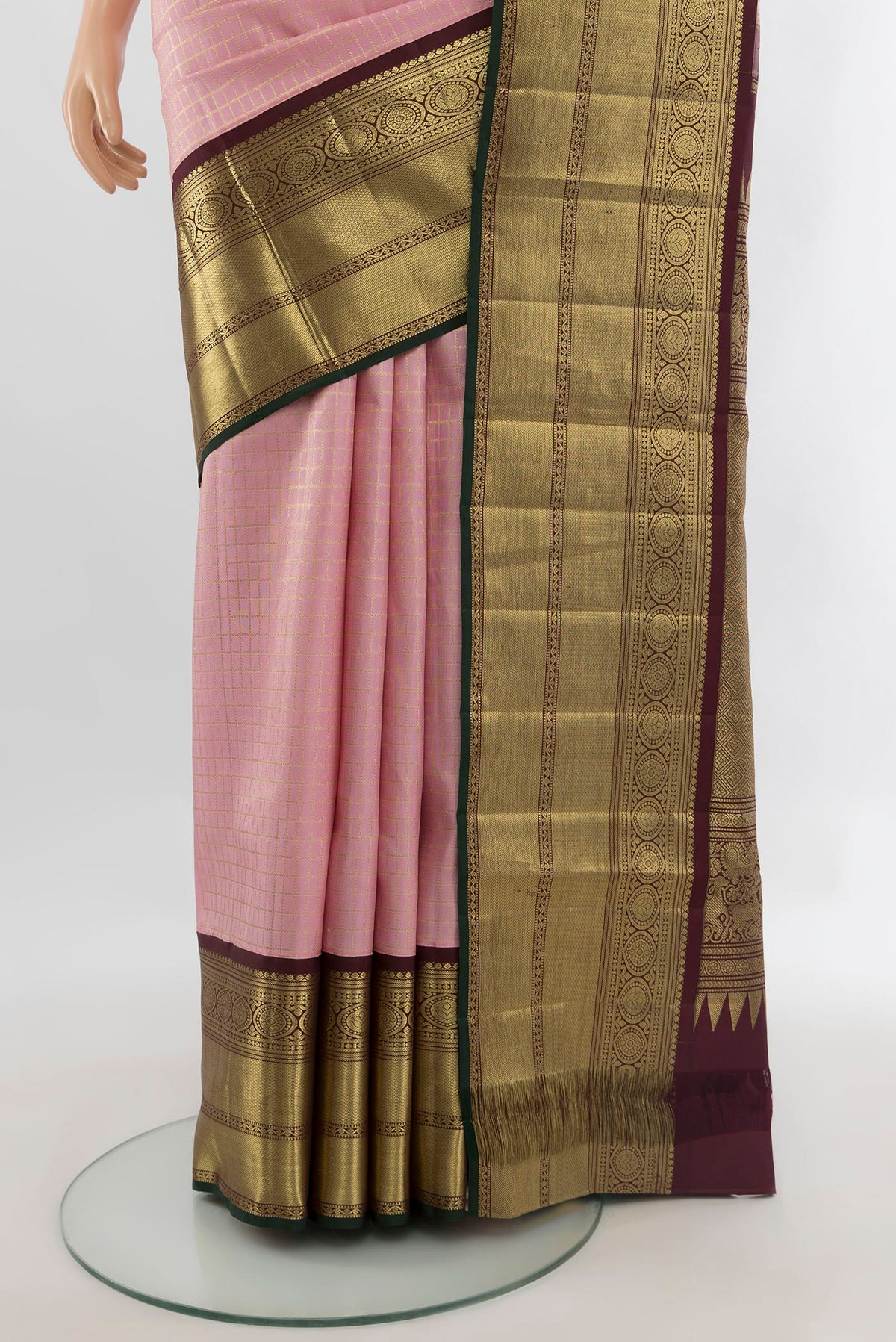Pleats and pallu of Pure Silk Rose pink Kanchipuram Saree with Checked design on the body and Zari Border. 