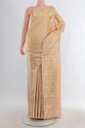 Pure Silk Sandal Kanchipuram Saree with Zari Brocade on the body and Zari Border.  displayed on a mannequin