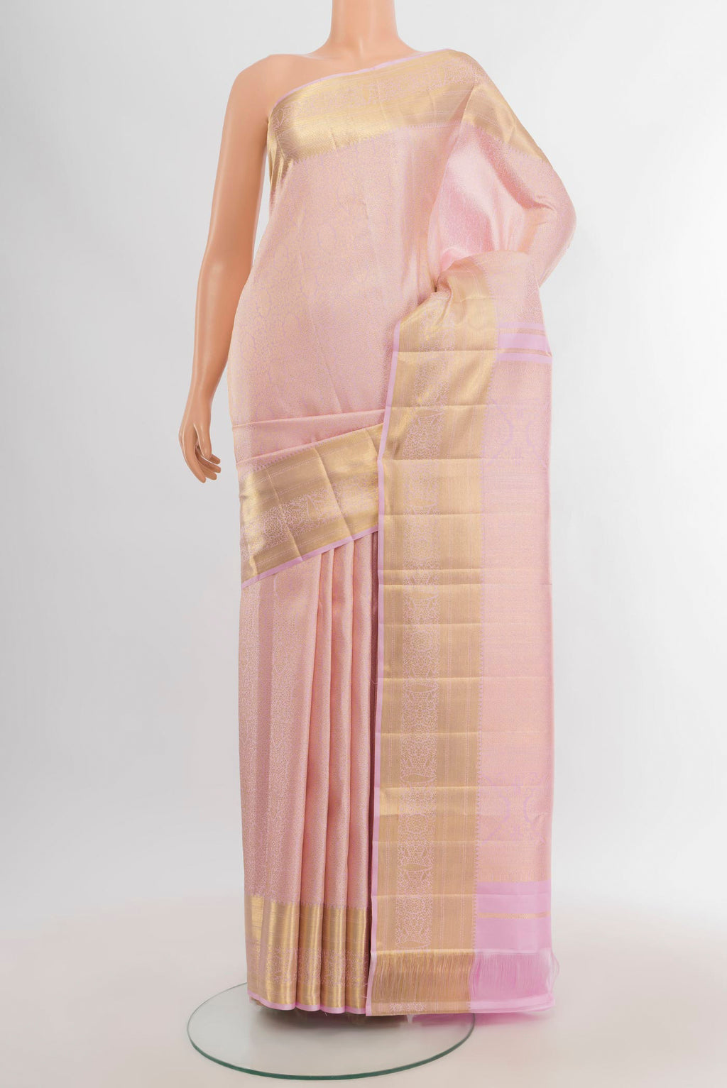 Rose pink Kanchipuram Silk Saree with Zari Brocade on the body and Zari Border.  displayed on a mannequin