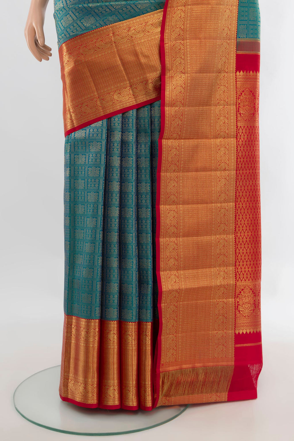 Pleats and pallu of Pure Silk Peacock Blue Kanchipuram Saree with Zari Brocade on the body and Zari Border. 