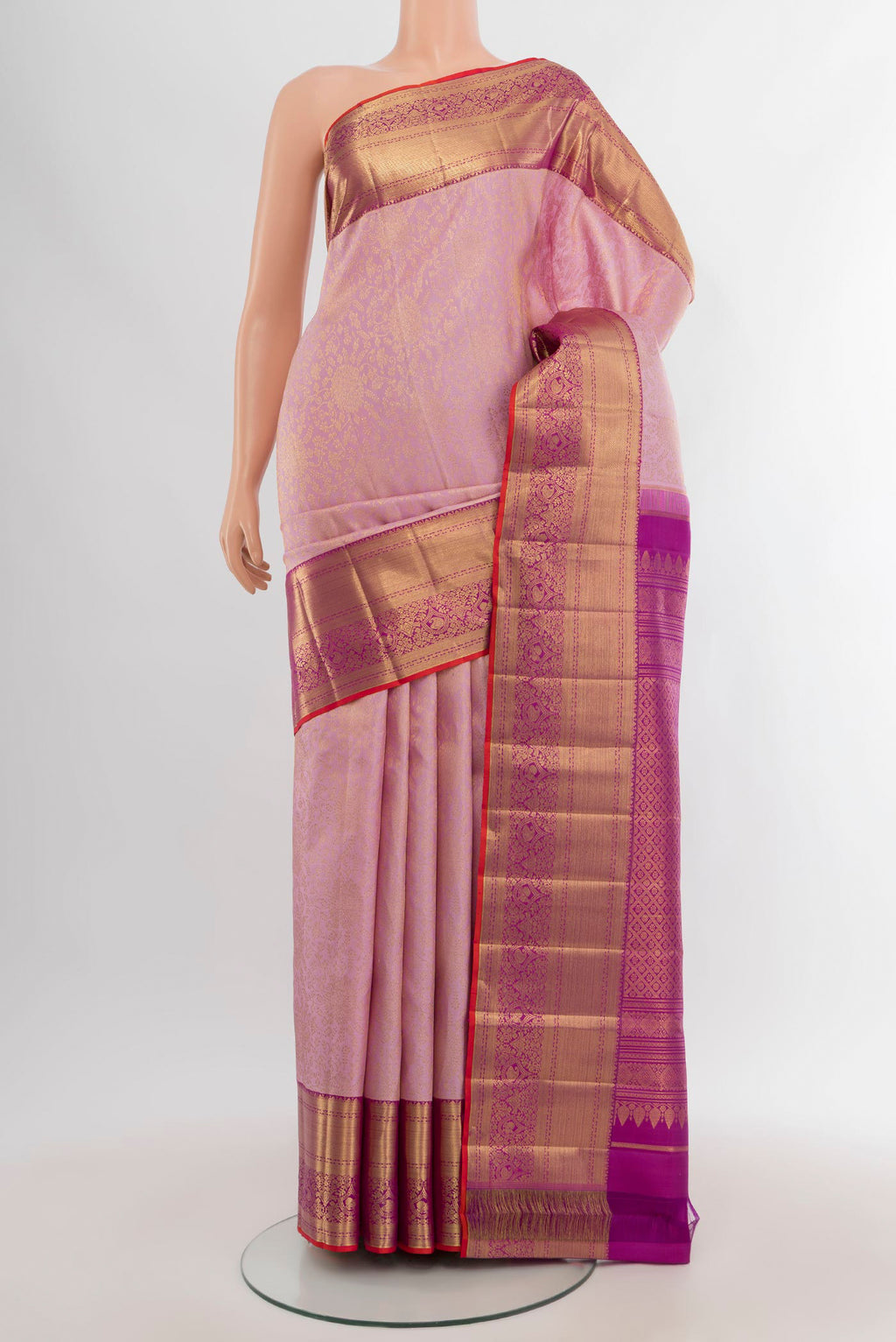 Rose pink Kanchipuram Silk Saree with Zari Brocade on the body and Zari Border.  displayed on a mannequin
