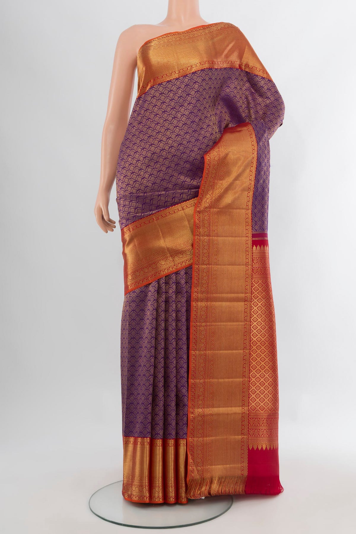 Violet Kanchipuram Silk Saree with Zari Brocade on the body and Zari Border.  displayed on a mannequin