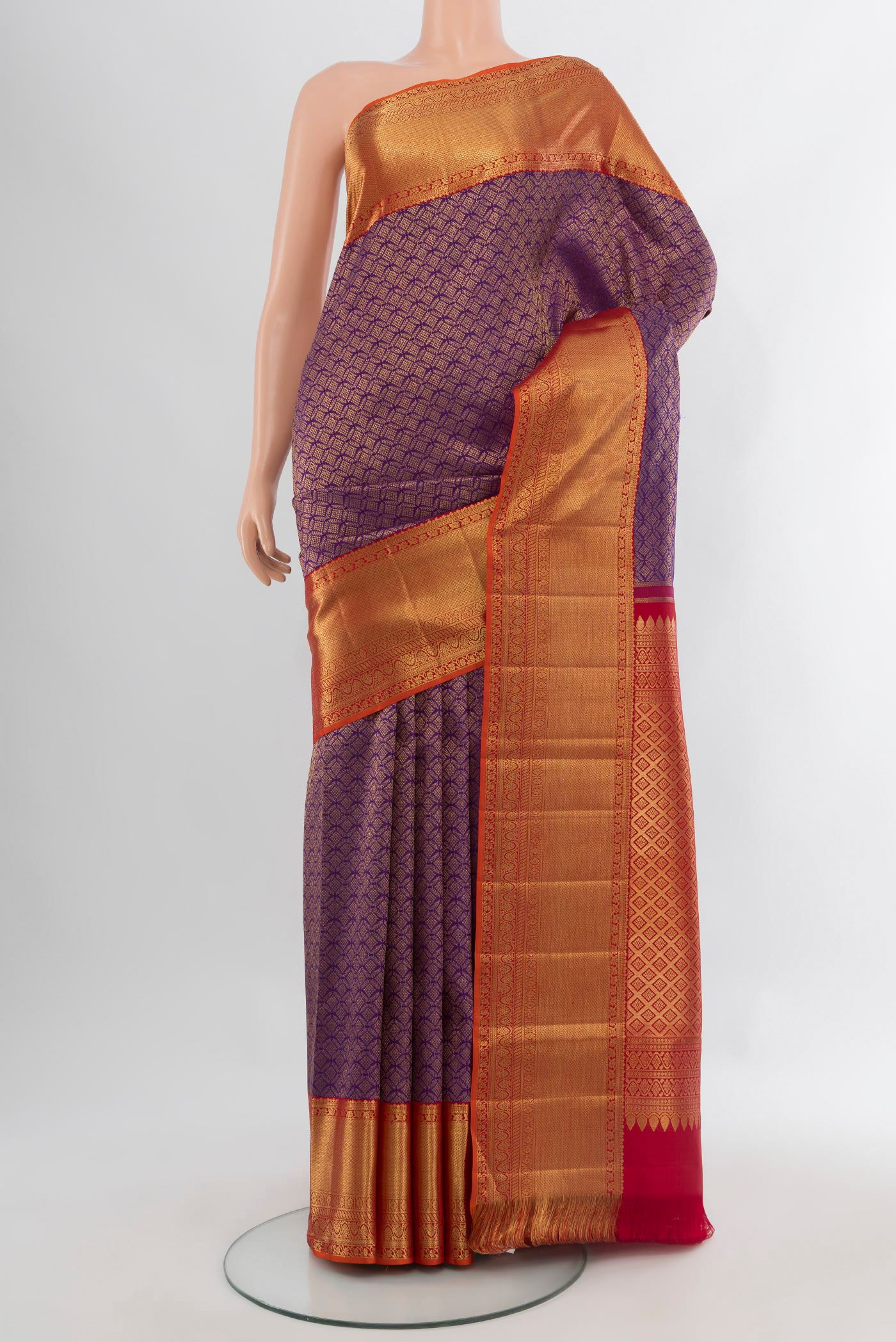 Violet Kanchipuram Silk Saree with Zari Brocade on the body and Zari Border.  displayed on a mannequin