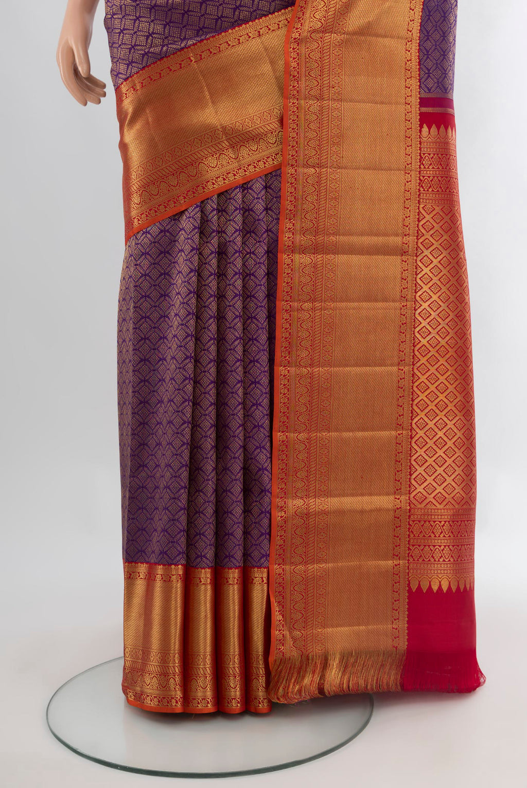 Pleats and pallu of Violet Kanchipuram Silk Saree with Zari Brocade on the body and Zari Border. 