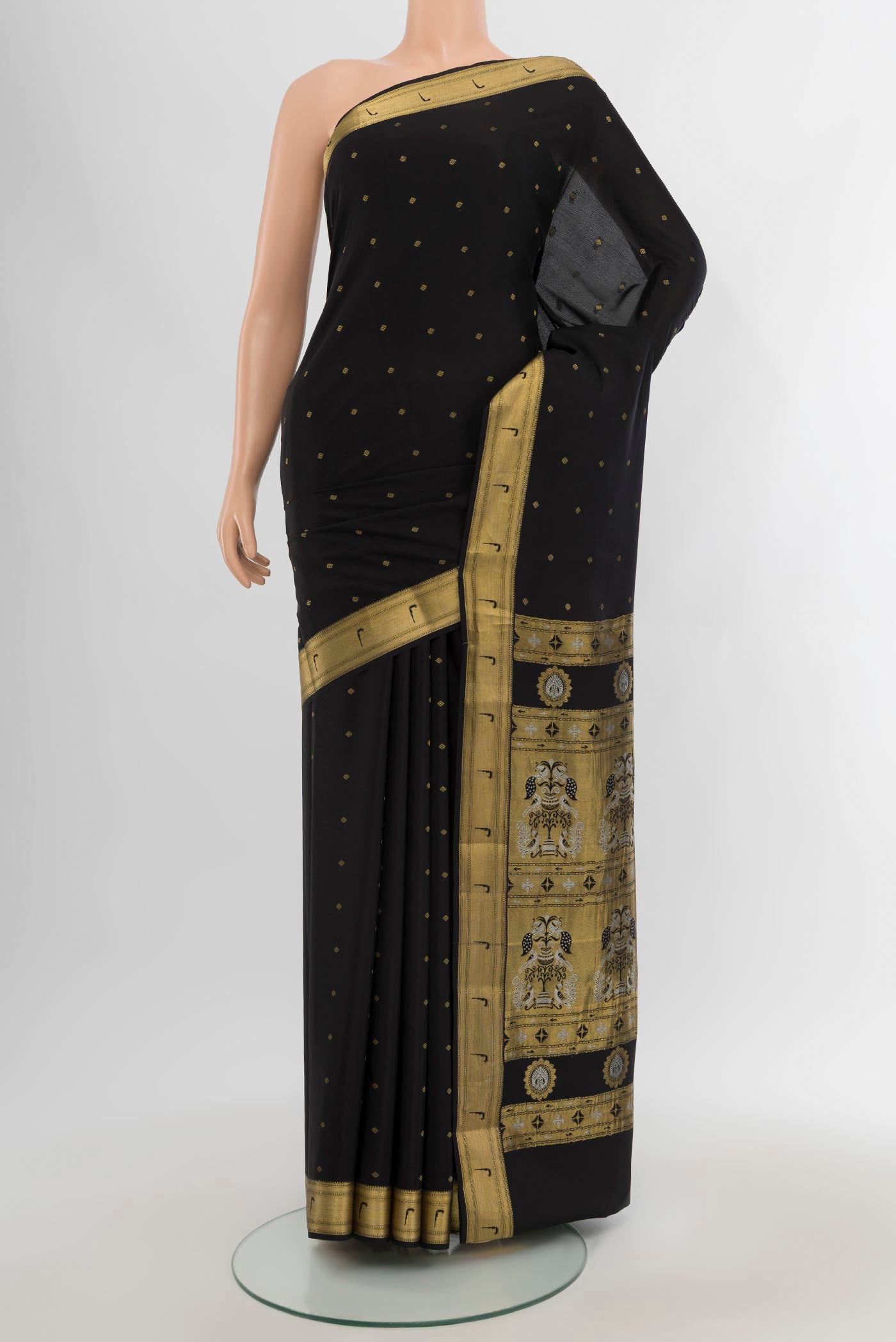 Black Mysore Crepe Saree with Zari Butta on the body and Zari Border.  displayed on a mannequin