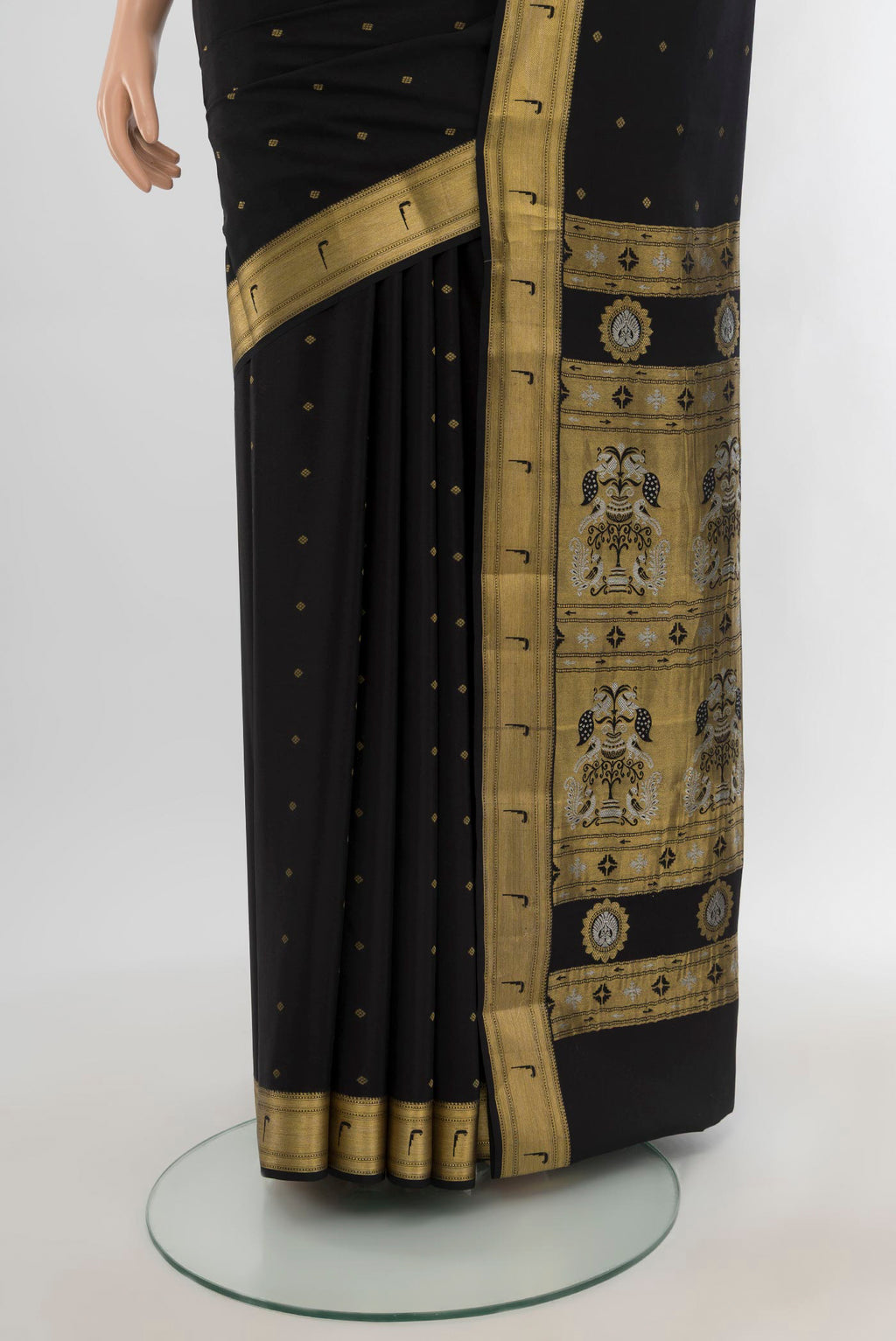 Pleats and pallu of Black Mysore Crepe Saree with Zari Butta on the body and Zari Border. 