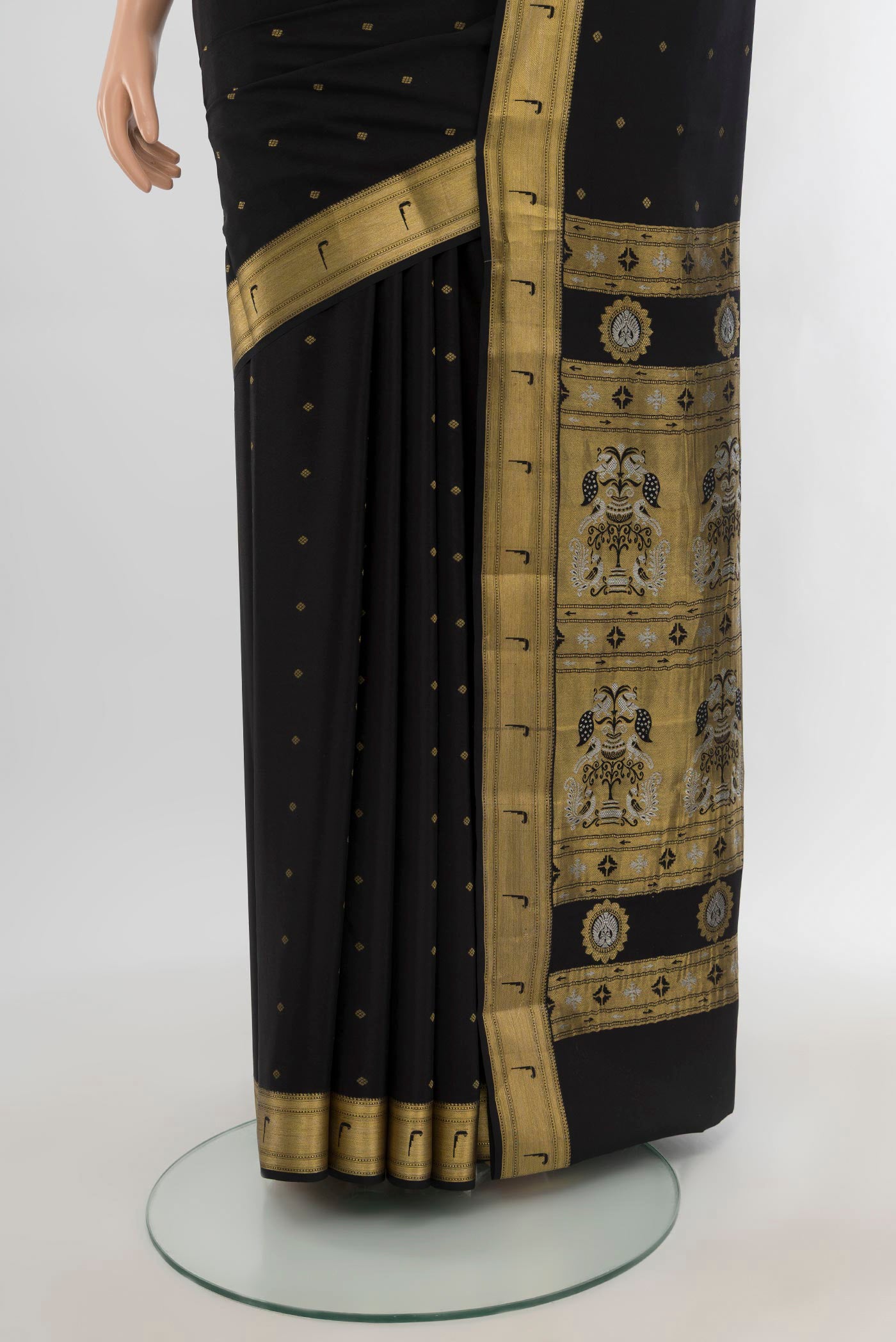 Pleats and pallu of Black Mysore Crepe Saree with Zari Butta on the body and Zari Border. 