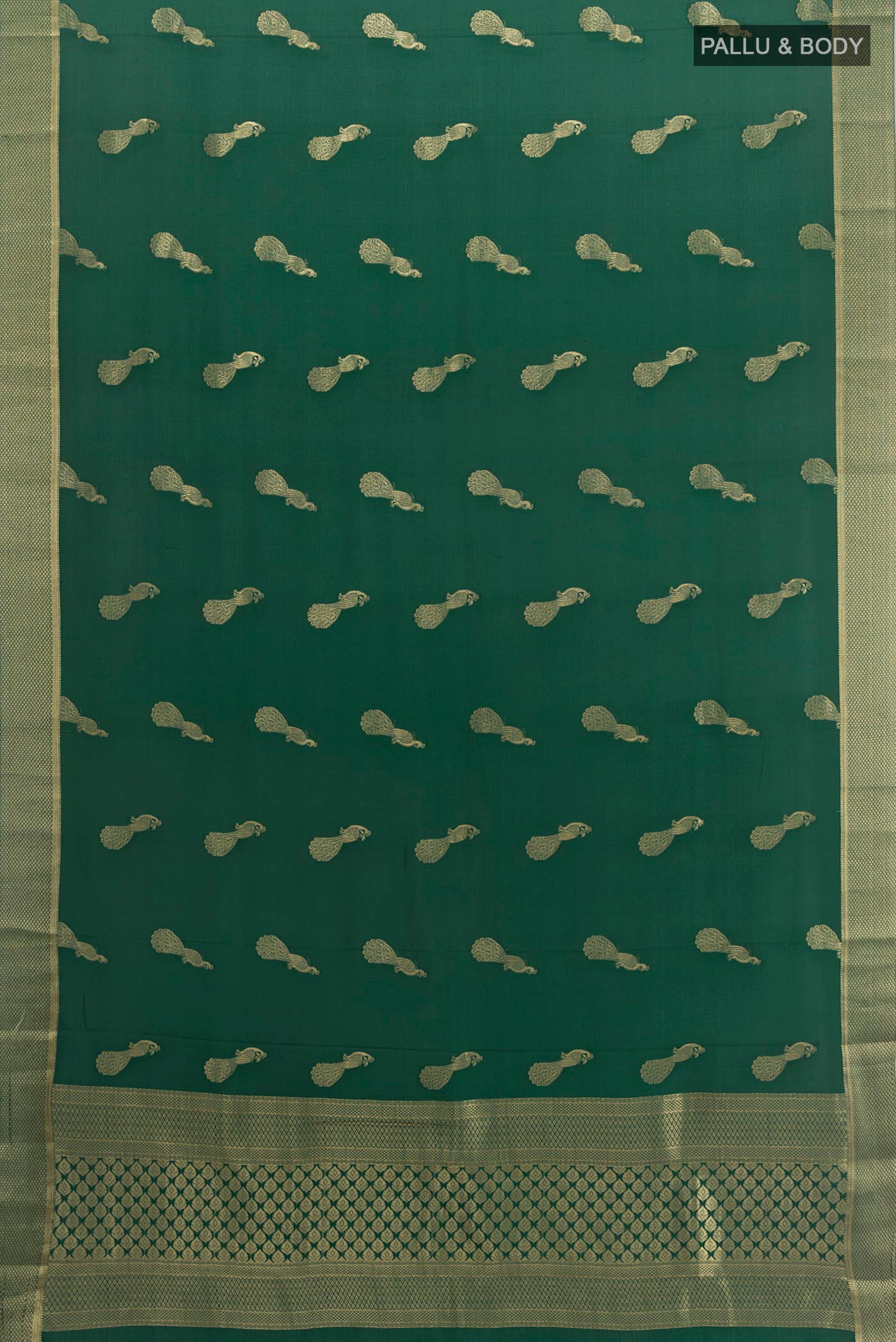 Flat view of Bottle Green Mysore Crepe Saree with Zari Butta on the body and Zari Border. 