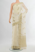 Cream Mysore Crepe Saree with Zari Butta on the body and Zari Border.  displayed on a mannequin