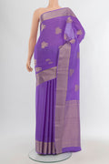 Lavender Mysore Crepe Saree with Zari Butta on the body and Zari Border.  displayed on a mannequin