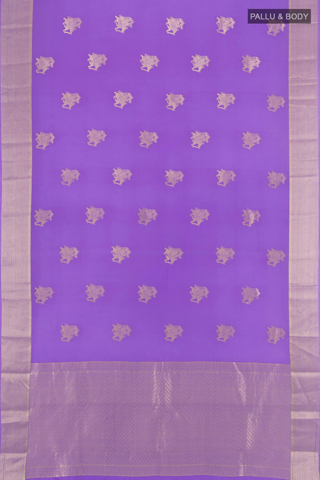Flat view of Lavender Mysore Crepe Saree with Zari Butta on the body and Zari Border. 