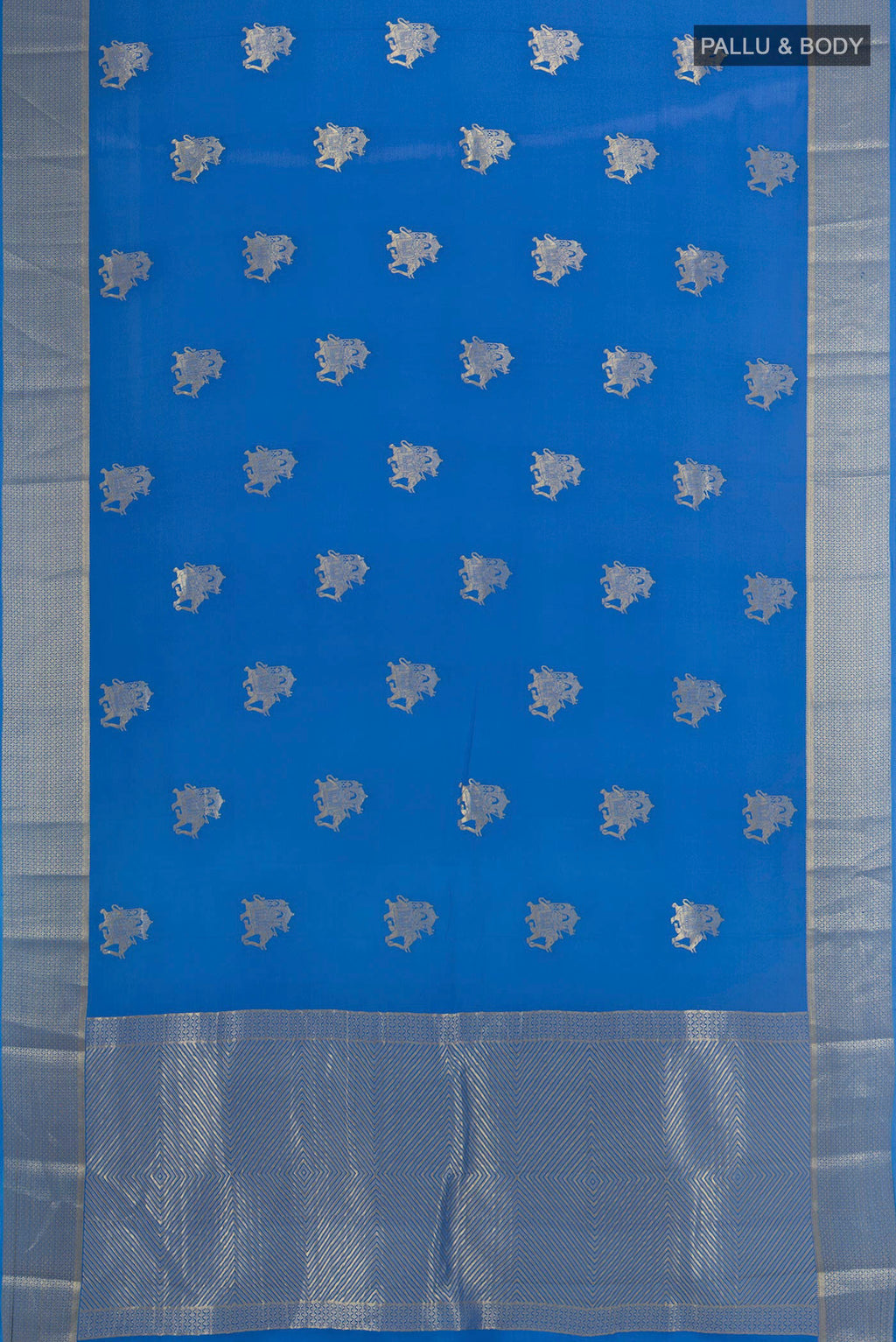 Flat view of Royal Blue Mysore Crepe Saree with Zari Butta on the body and Zari Border. 