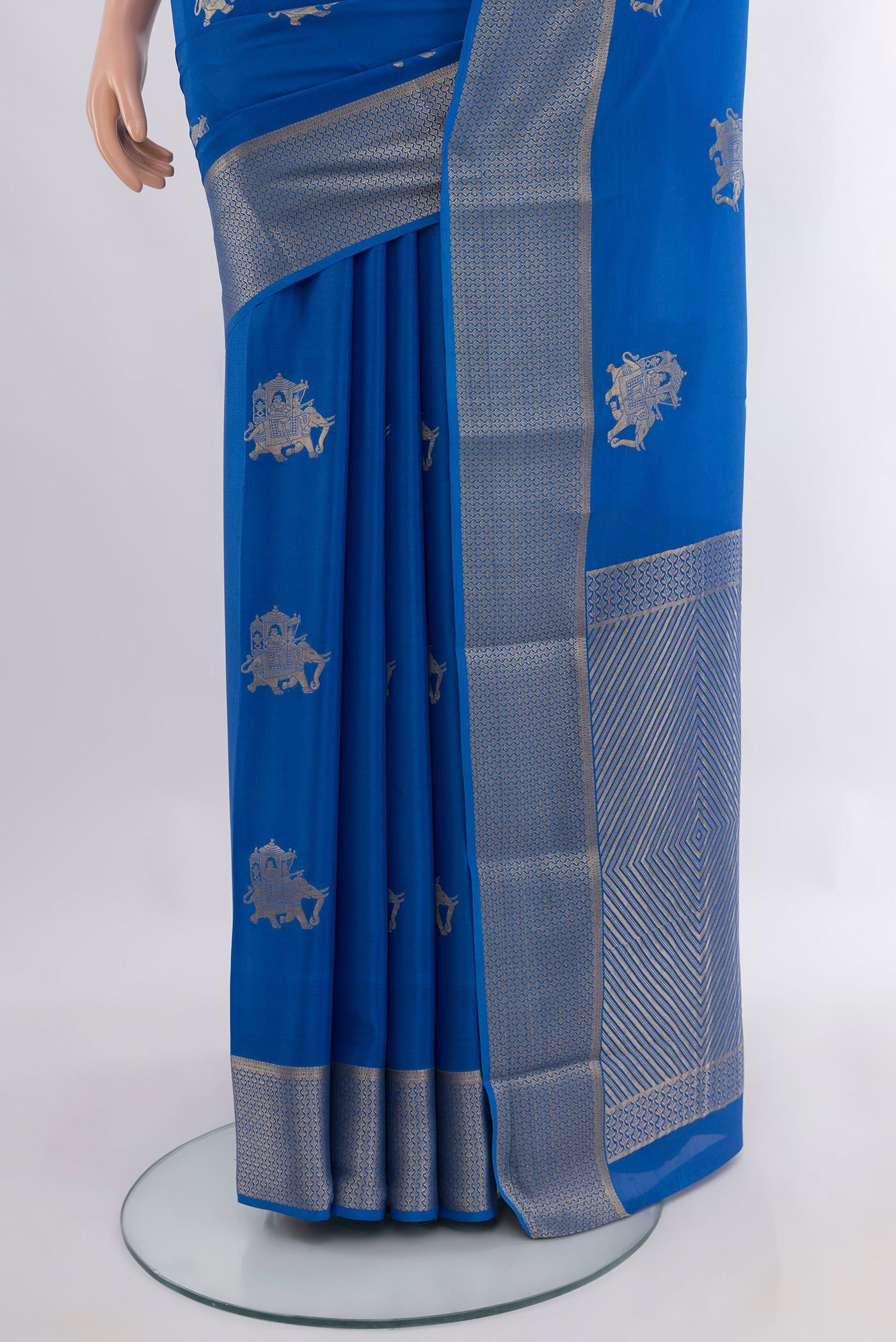 Pleats and pallu of Royal Blue Mysore Crepe Saree with Zari Butta on the body and Zari Border. 