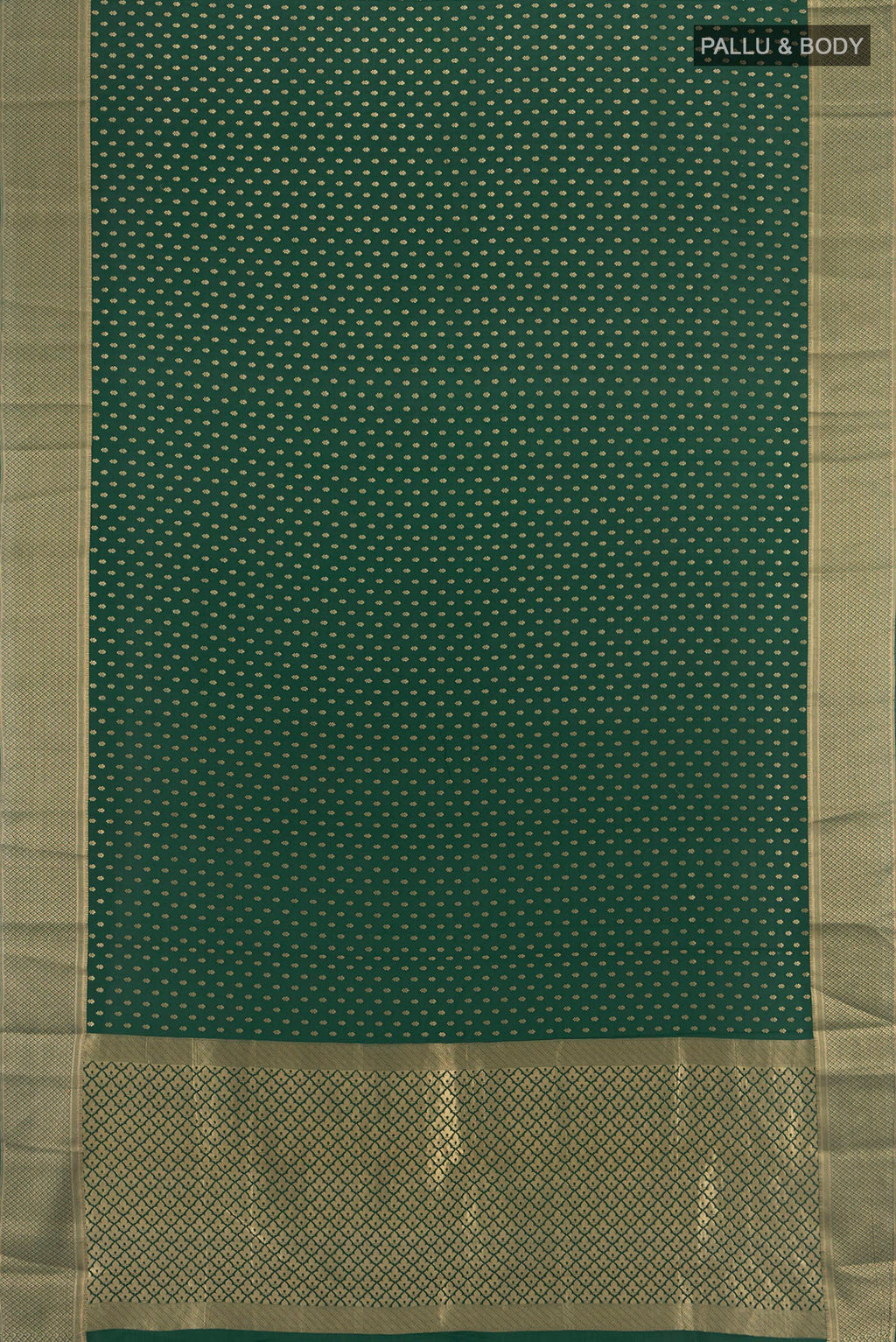 Flat view of Bottle Green Mysore Crepe Saree with Zari Butta on the body and Zari Border. 