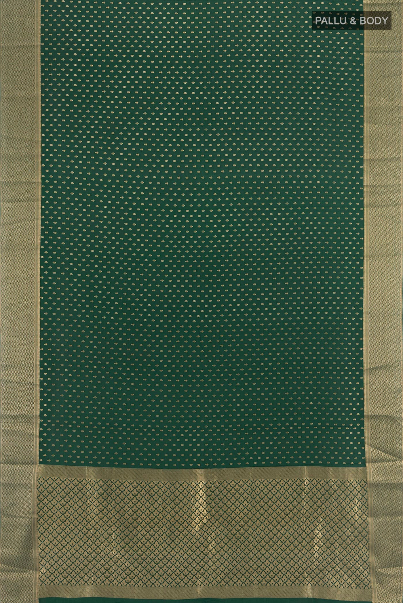 Flat view of Bottle Green Mysore Crepe Saree with Zari Butta on the body and Zari Border. 