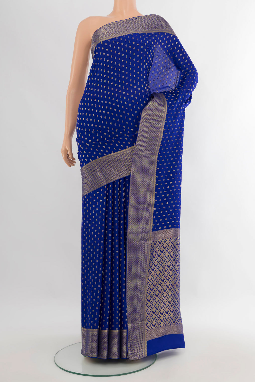 Royal Blue Mysore Crepe Saree with Zari Butta on the body and Zari Border.  displayed on a mannequin