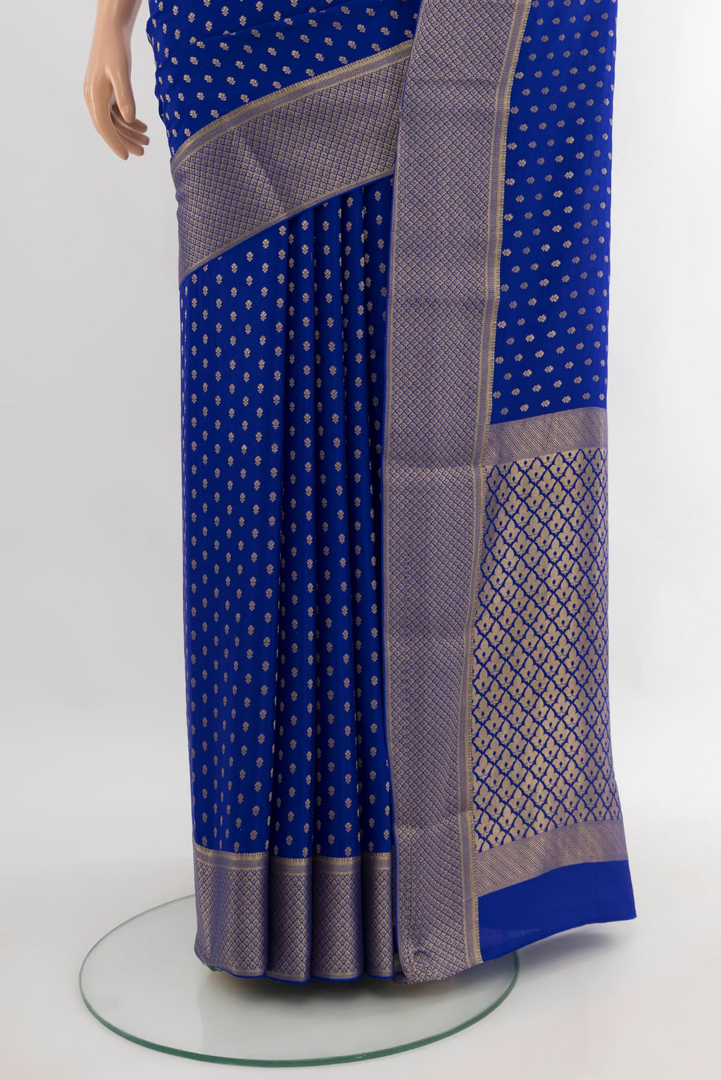 Pleats and pallu of Royal Blue Mysore Crepe Saree with Zari Butta on the body and Zari Border. 