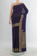 Navy Blue Mysore Crepe Saree with Zari Butta on the body and Zari Border.  displayed on a mannequin