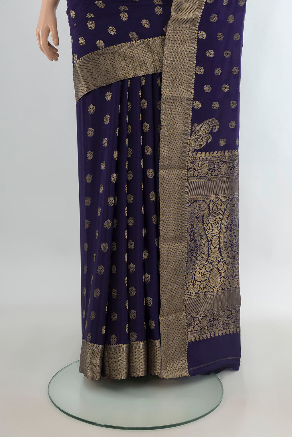 Pleats and pallu of Navy Blue Mysore Crepe Saree with Zari Butta on the body and Zari Border. 