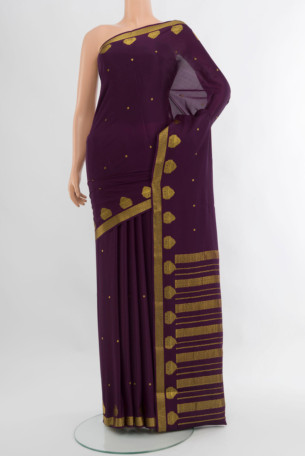 Violet Mysore Crepe Saree with Zari Butta on the body and Zari Border.  displayed on a mannequin