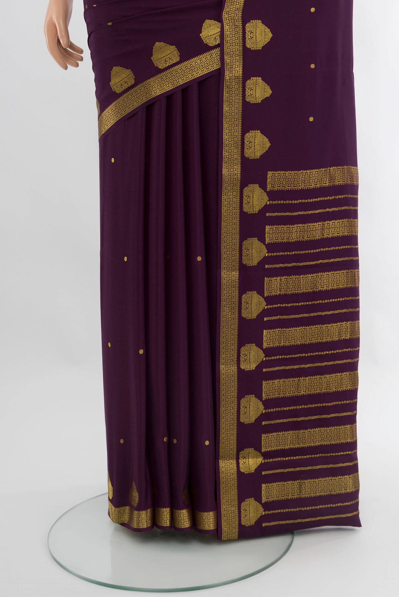 Pleats and pallu of Violet Mysore Crepe Saree with Zari Butta on the body and Zari Border. 