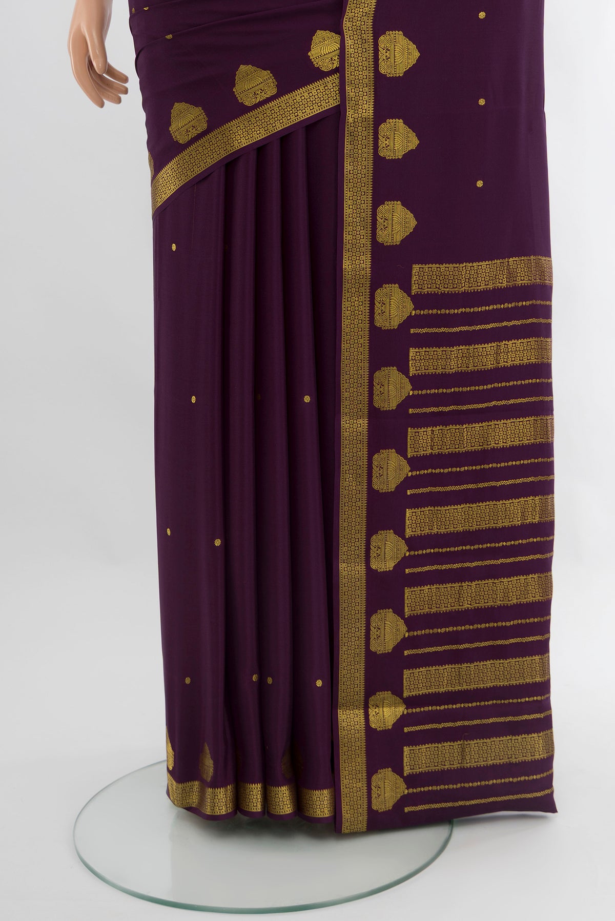 Pleats and pallu of Violet Mysore Crepe Saree with Zari Butta on the body and Zari Border. 