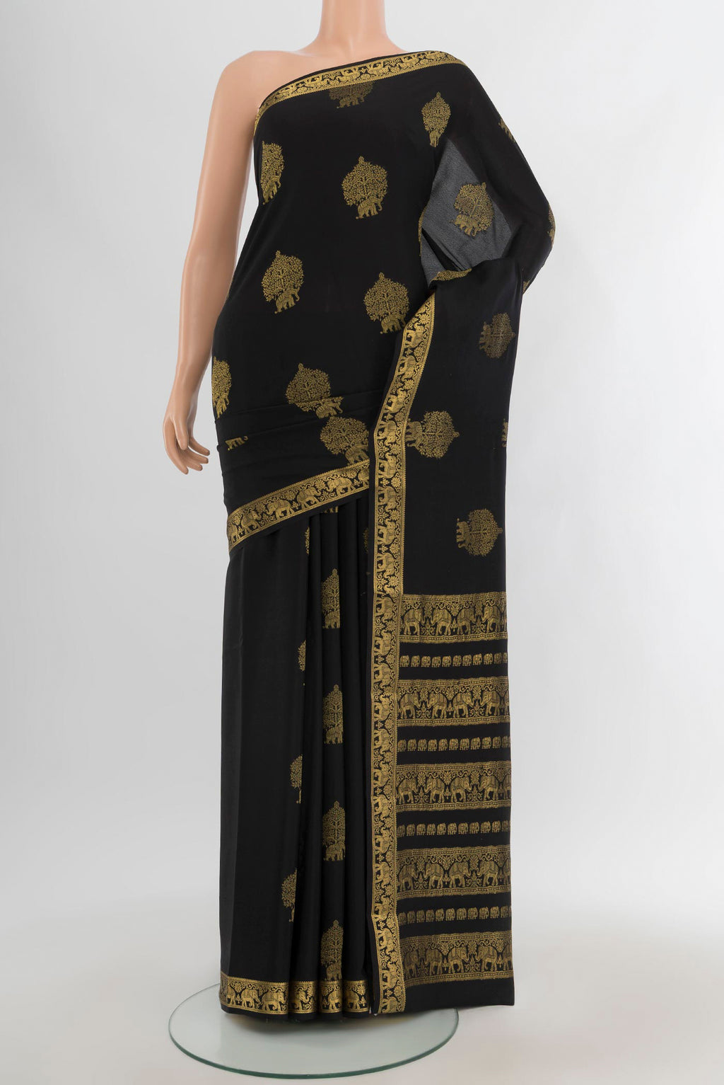 Black Mysore Crepe Saree with Zari Butta on the body and Zari Border.  displayed on a mannequin