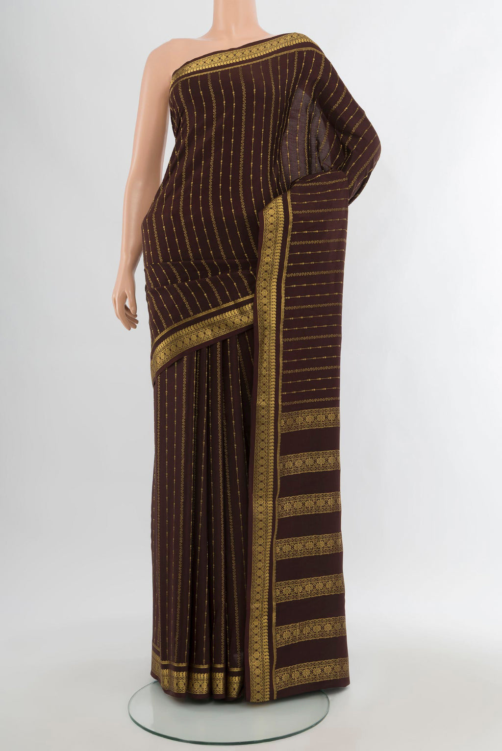 Coffee Brown Mysore Crepe Saree with Stripes on the body and Zari Border.  displayed on a mannequin