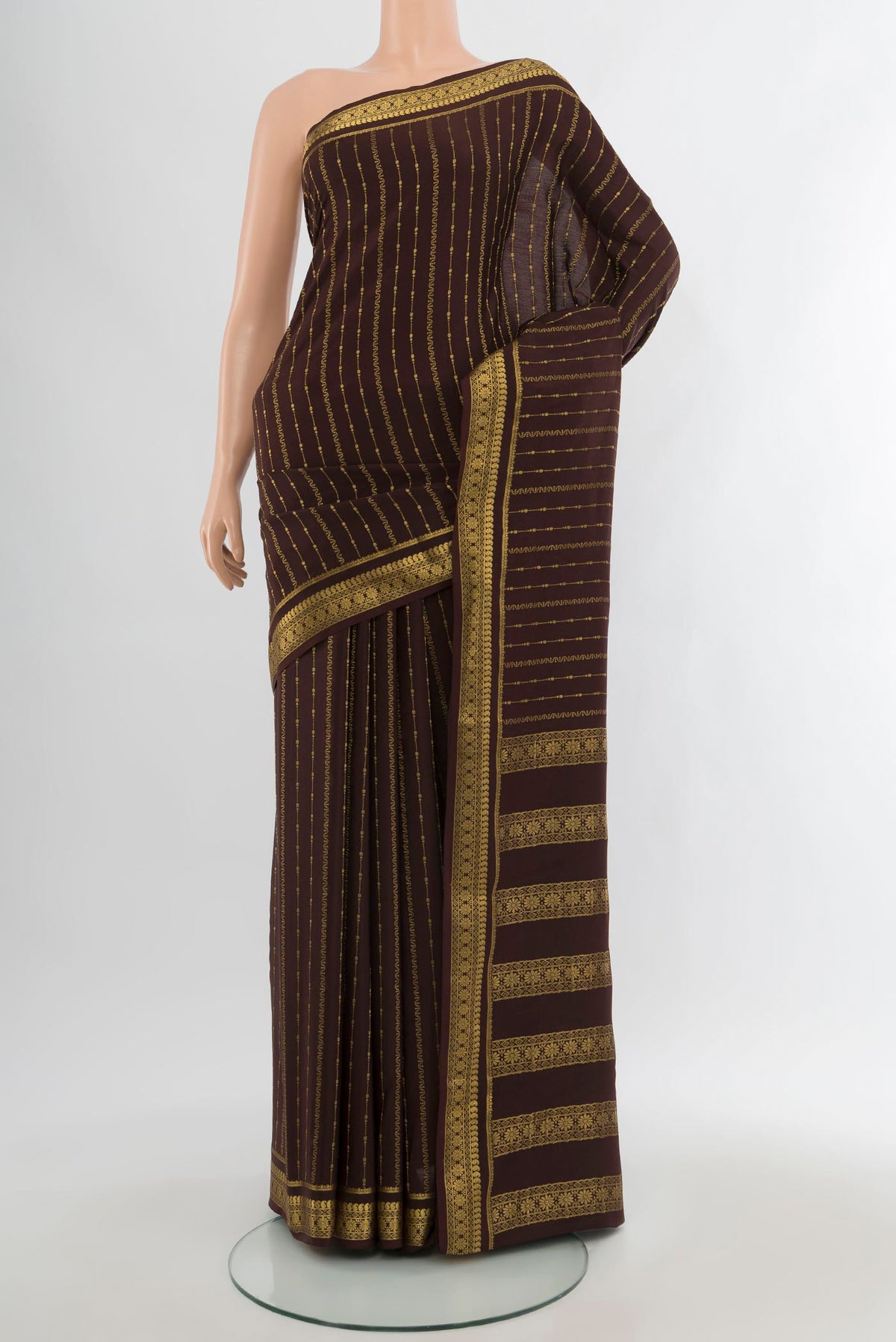 Coffee Brown Mysore Crepe Saree with Stripes on the body and Zari Border.  displayed on a mannequin