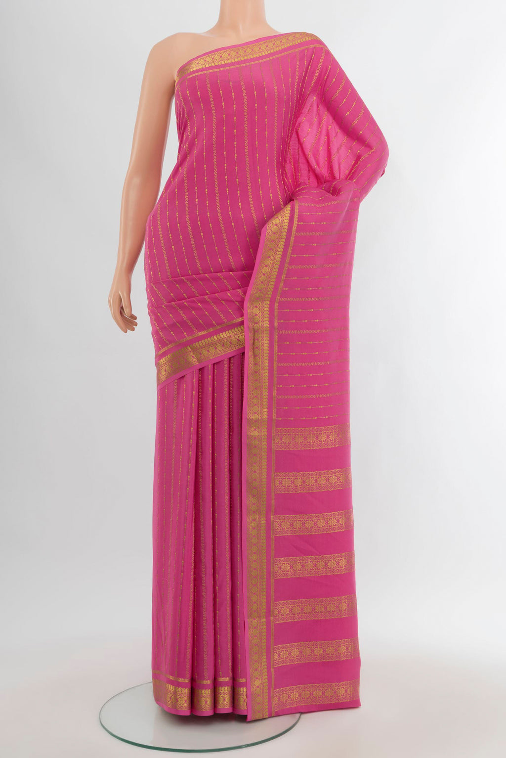 Rose pink Mysore Crepe Saree with Stripes on the body and Zari Border.  displayed on a mannequin