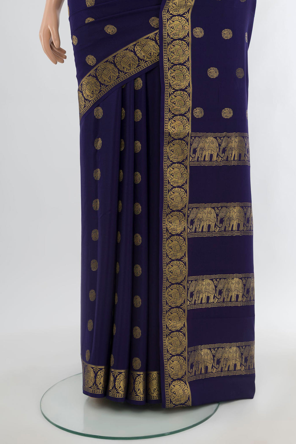Pleats and pallu of Navy Blue Mysore Crepe Saree with Zari Butta on the body and Zari Border. 