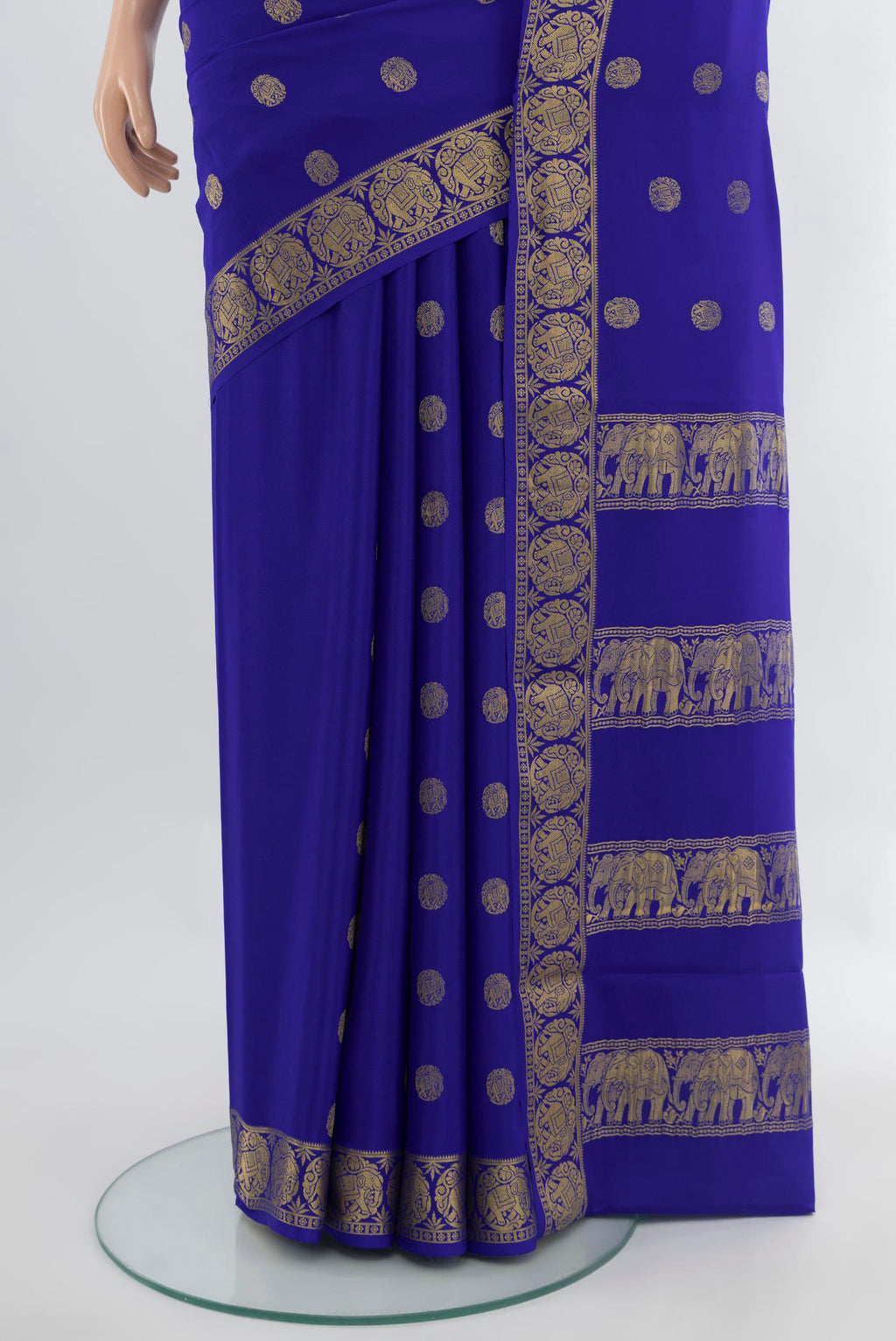 Pleats and pallu of Royal Blue Mysore Crepe Saree with Zari Butta on the body and Zari Border. 