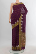 Purple Mysore Crepe Saree with Zari Butta on the body and Zari Border.  displayed on a mannequin