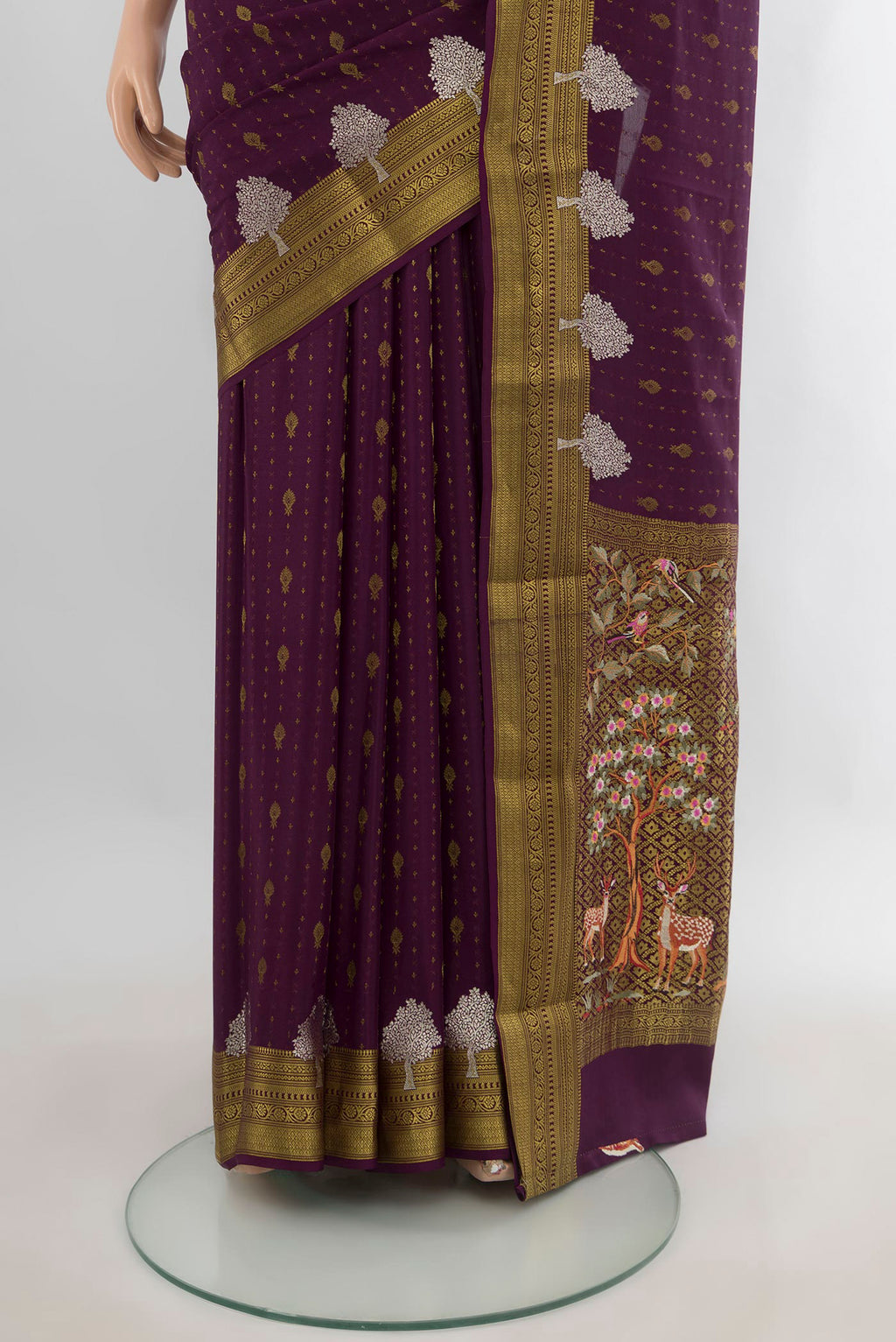 Pleats and pallu of Purple Mysore Crepe Saree with Zari Butta on the body and Zari Border. 