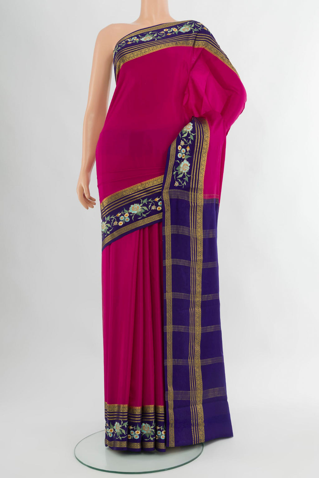Dark Pink Mysore Crepe Saree with Plain Body and Zari Border.  displayed on a mannequin