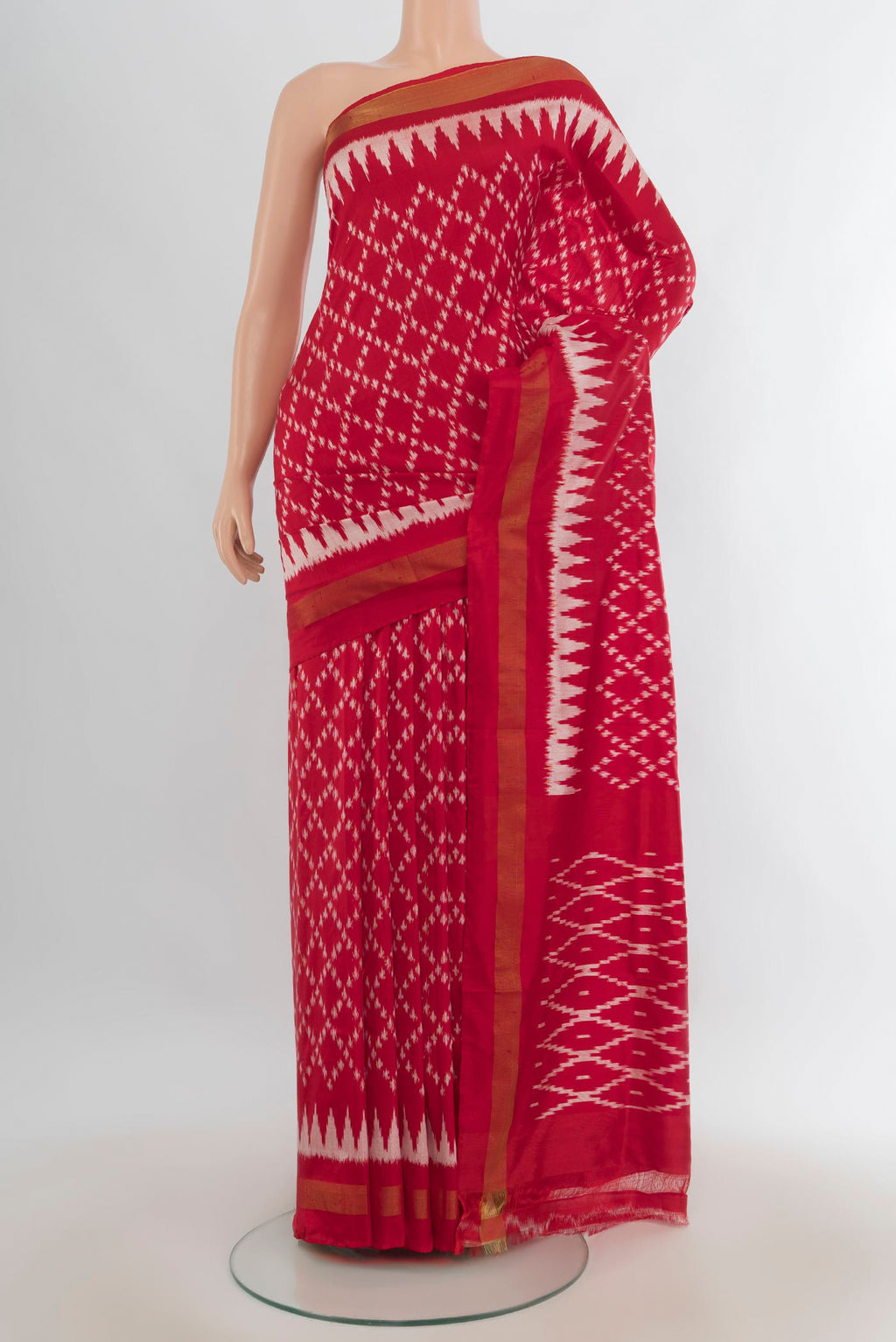Pure Silk Red Pochampally Saree with Pure Ikat on the body and Zari Border.  displayed on a mannequin