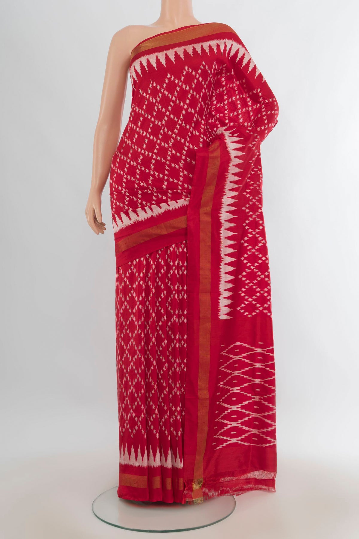 Pure Silk Red Pochampally Saree with Pure Ikat on the body and Zari Border.  displayed on a mannequin