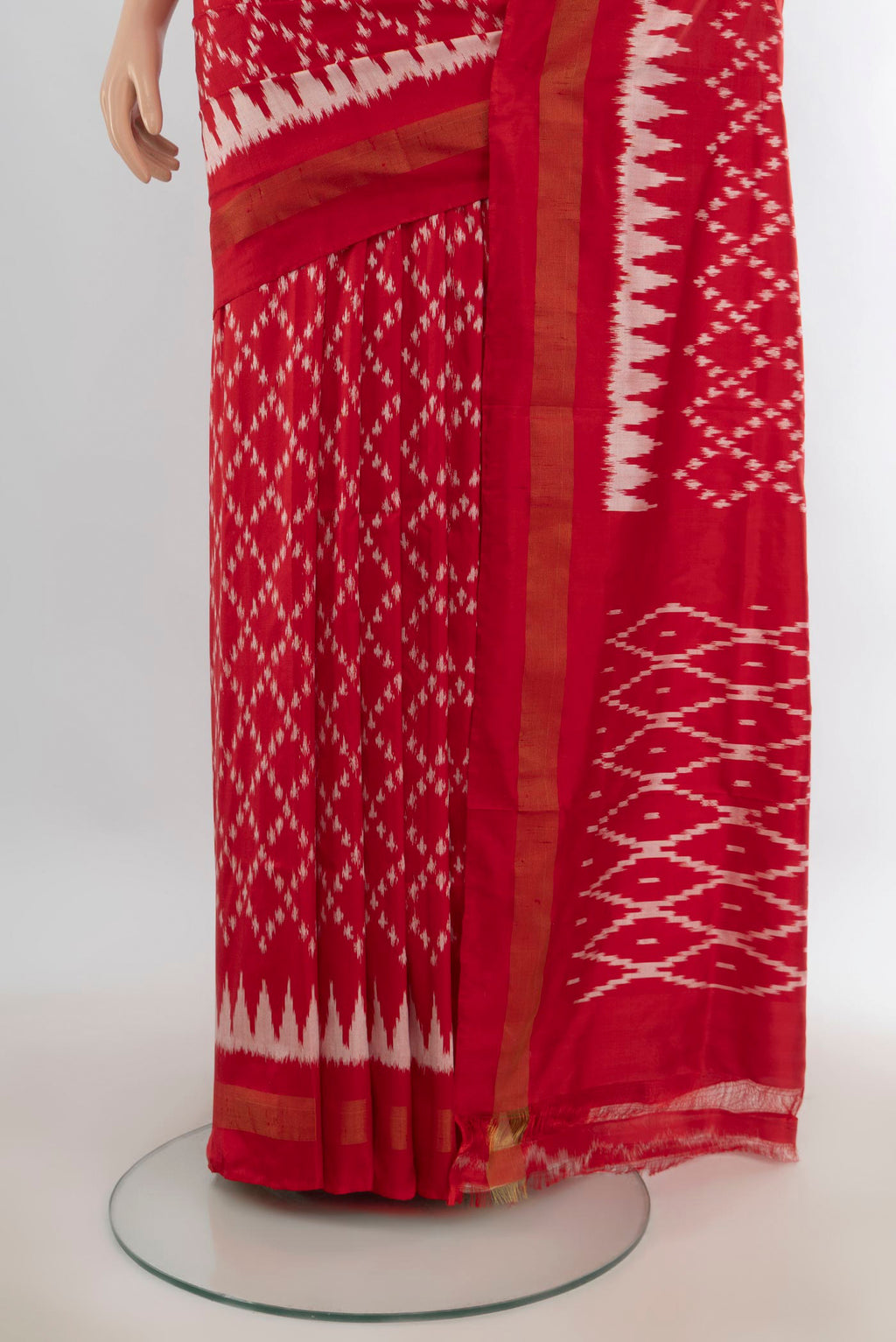 Pleats and pallu of Pure Silk Red Pochampally Saree with Pure Ikat on the body and Zari Border. 