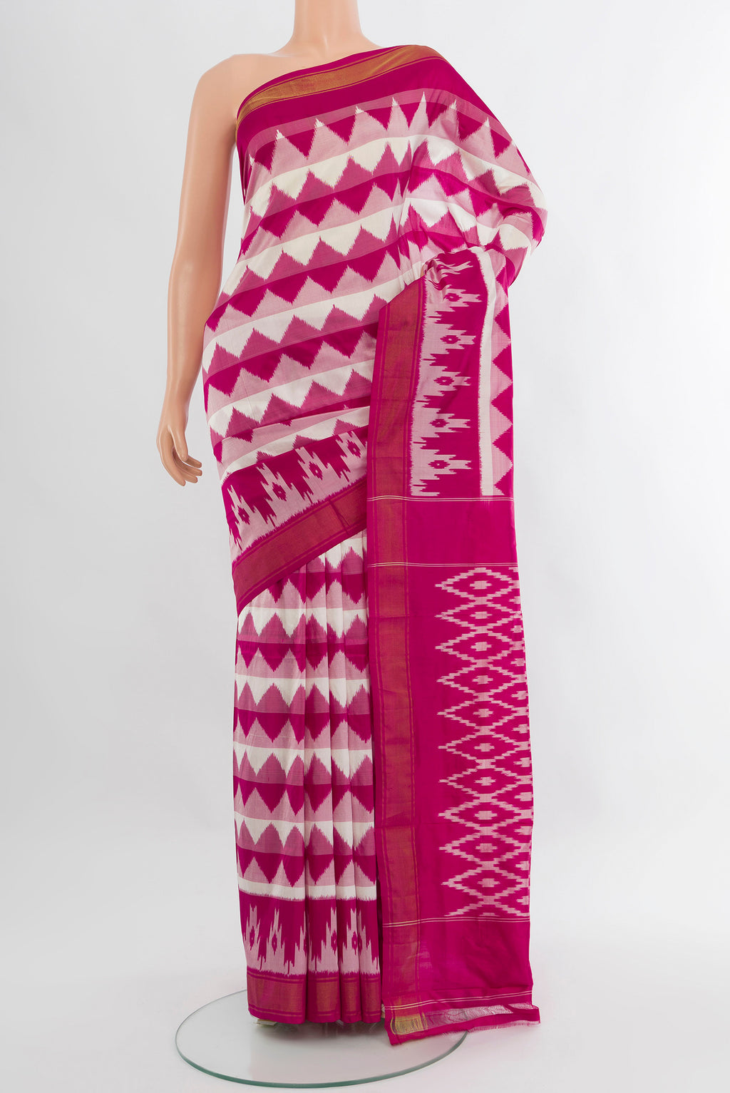 Pink Pochampally Silk Saree with Ikat design on the body and Zari Border.  displayed on a mannequin
