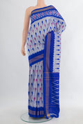 Pure Silk Grey Pochampally Saree with Ikat Print on the body and Ikat Border.  displayed on a mannequin